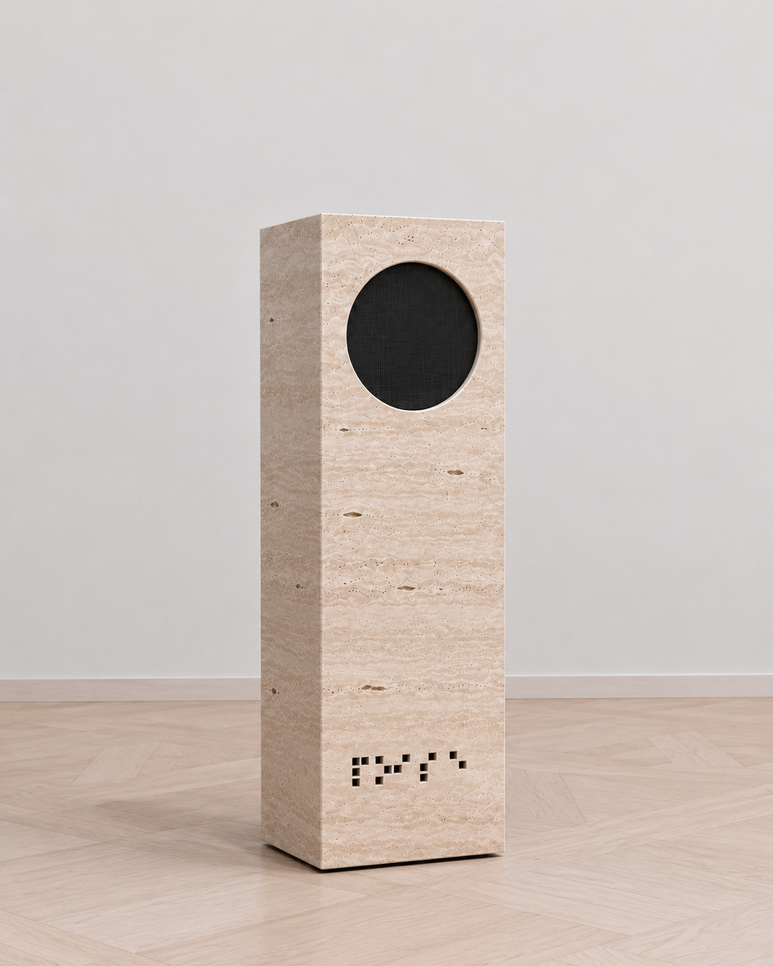 NOISE natural matte travertine speaker in three-quarter view.